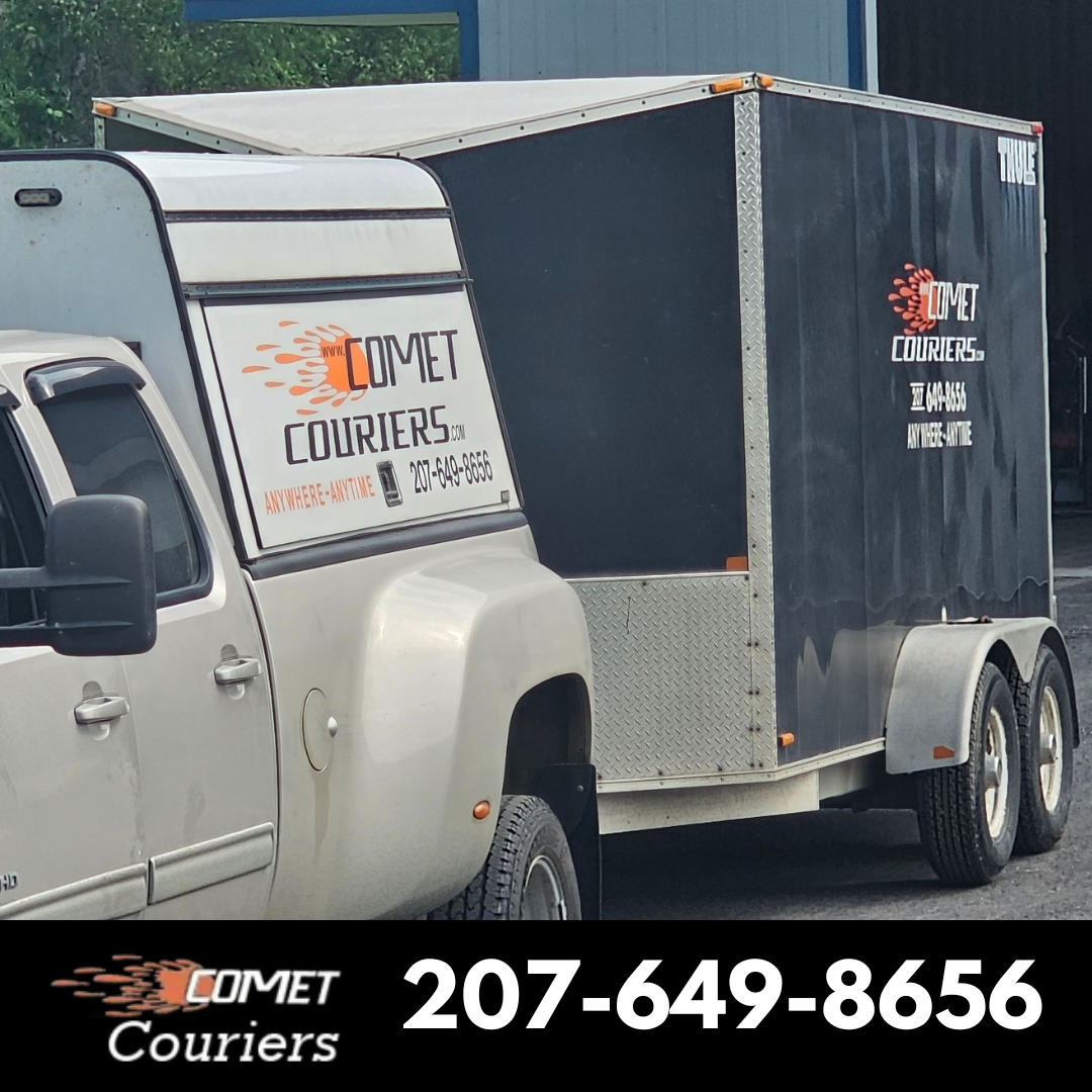 Branded Comet Couriers enclosed cargo trailer ready for a same-day Maine delivery