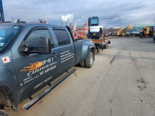 Comet Couriers Equipment Transport: Pickup Truck and Flatbed Trailer Moving Excavator to Job Site
